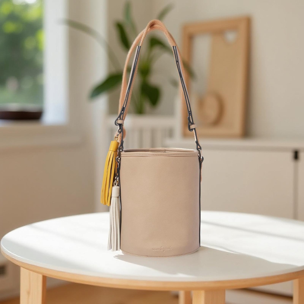 Urban Originals Two Lovers vegan leather Beige Bucket Bag with Tassel